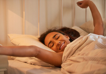 Woman, wake up and stretching in bed after sleeping or resting alone for feeling fresh and home....