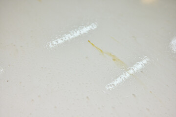Foam covers car in garage tires, wheels, lights, hood, automotive design