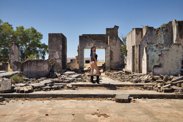 South American woman, young, beautiful, brunette with lingerie and black wings, posing in the...