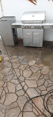 Terrace is cleaned of dirt with a high-pressure cleaner with dirty water and clean slabs