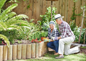 Senior couple, happy and gardening outdoor for love, environment and sustainability in home. Man,...