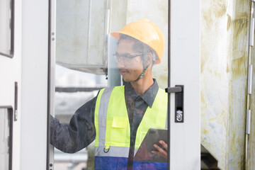 Male electrician worker checking, repair, maintenance operation electric system. Asian male...