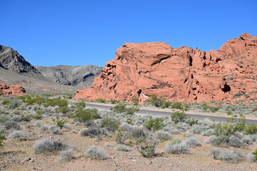 A road running through The Valley of Fire state park on a scorching April day in 2024.