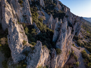 Fototapeta na wymiar Frares of Quatretondeta, Serrella mountain on evening light, Costa Blanca, Quatretondeta, Alicante, Spain - stock photo