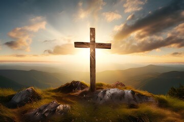 Wooden cross on hill top with sun shining bright behind, redemption concept.