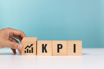 KPI, Employee proformance, Key Performance Indicator concept. Wooden cubes with the abbreviation...