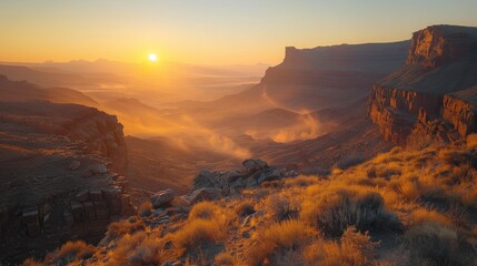 Sunrise behind rugged canyon