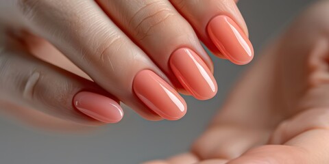 manicure in color on well-groomed female hands