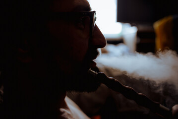 person smoking cigarette