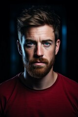 Fototapeta premium Portrait of a serious man with red beard