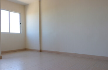 empty room with white wall and window