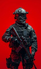 Special forces soldier in black uniform and mask holding a gun