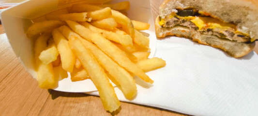 Fast food hamburgers can be eaten quickly.