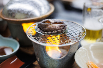 Grilled abalone dinner in Japan