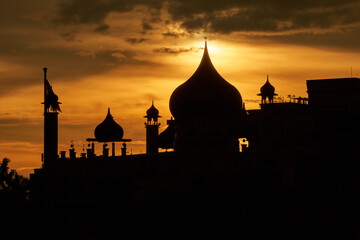 Silhouette of Mosque during sunrise at Kuching, Sarawak, Malaysia. Kuching City Mosque.