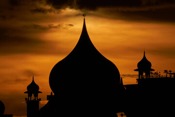 Silhouette of Mosque during sunrise at Kuching, Sarawak, Malaysia. Kuching City Mosque.