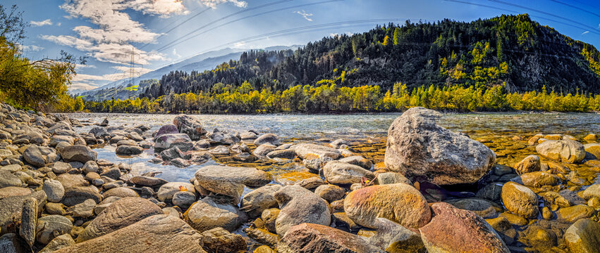 Rocky Isel  River With Background Mountains