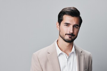 copyspace man handsome suit business happy businessman beige portrait posing smiling