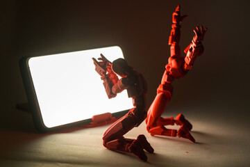 Concept photo of people's addiction to social networks. Figures of people with a telephone

