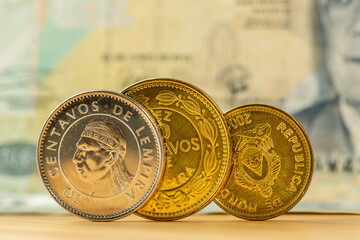 Honduras money, Honduran lempiras coins on paper banknote background, financial concept