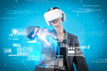 Caucasian business woman using VR goggle to look at financial data analysis while standing at...