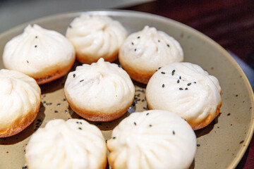 Sizzling Shanghai Sheng Jian Bao on a Plate, the Quintessence of Pan-Fried Delights