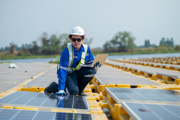 Technician Adjusting Solar Panel at Installation Site