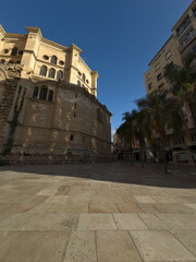 Empty, narrow street in the center of the old town. Facade of historic old buildings.
