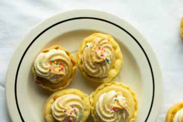 Group photo of homemade lemon meringues.