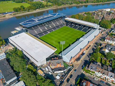 Fulham, London. United Kingdom. 08.15.2023 Aerial image of Craven Cottage Stadium. Fulham Football Club. Along the River Thames. 15th August 2023