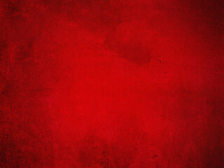 Red texture of suede leather with a vignette along the edge.