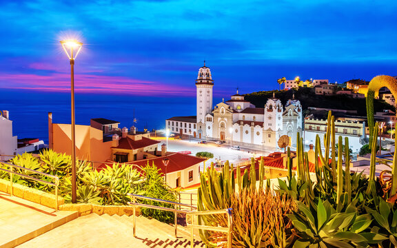 Aerial night view of Basilica de Nuestra Senora de Candelaria and the town square illuminated at the blue hour in Tenerife Island - Canaries - Powered by Adobe