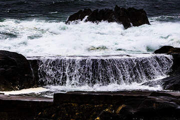 waves crashing on the rocks