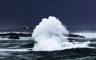 waves crashing on the rocks