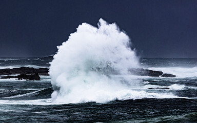 waves crashing on the rocks