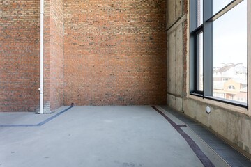 interior of the apartment without decoration in gray colors. rough finish