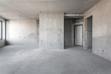 interior of the apartment without decoration in gray colors. rough finish