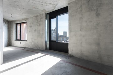 interior of the apartment without decoration in gray colors. rough finish