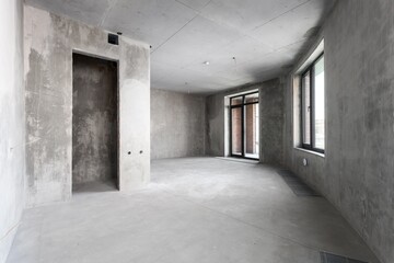 interior of the apartment without decoration in gray colors. rough finish