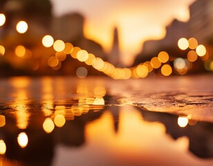 A puddle reflecting street lamps with the surrounding area melting into warm yellow and orange bokeh circles