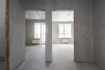 interior of the apartment without decoration in gray colors. rough finish