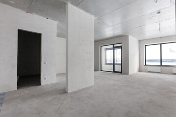 interior of the apartment without decoration in gray colors. rough finish