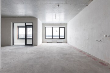 interior of the apartment without decoration in gray colors. rough finish