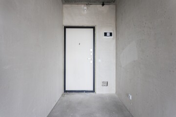 interior of the apartment without decoration in gray colors. rough finish