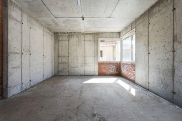 interior of the apartment without decoration in gray colors. rough finish