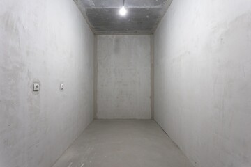 interior of the apartment without decoration in gray colors. rough finish