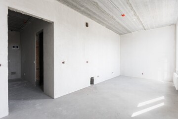 interior of the apartment without decoration in gray colors. rough finish