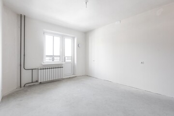 interior of the apartment without decoration in gray colors. rough finish