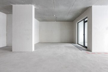 interior of the apartment without decoration in gray colors. rough finish