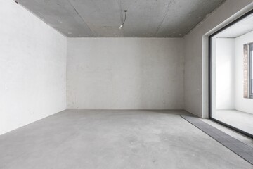 interior of the apartment without decoration in gray colors. rough finish